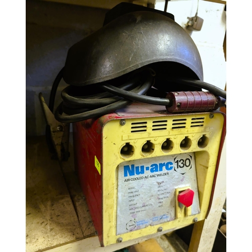 125 - An arc welder Nu-Arc and helmet.