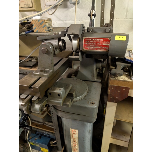 127 - A Clarkson tool and cutter grinder, capacity 12x6 dia. serial No. 1376, with angle lamp and accessor... 