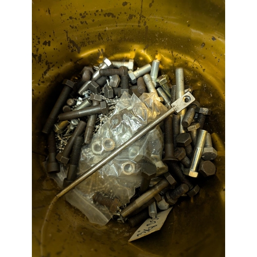 131 - A bucket of bolts and a chain, other nuts and bolts.