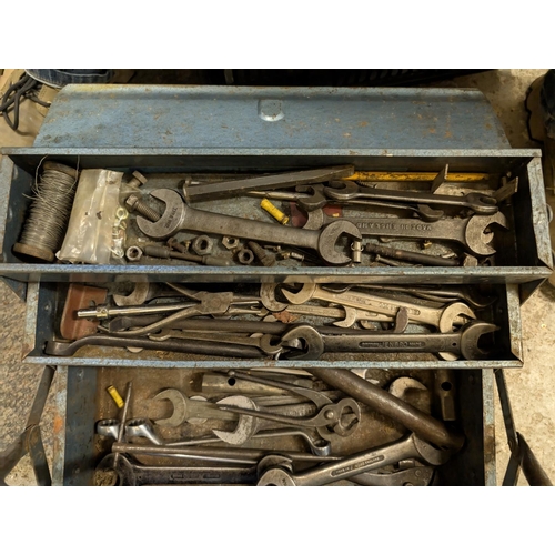 136 - A vintage tool box containing wrenches and tools.