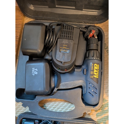 31 - A Power Craft cased 18v drill and a Performance Power 12v drill, cased.