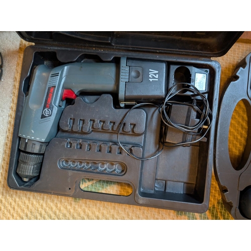 31 - A Power Craft cased 18v drill and a Performance Power 12v drill, cased.