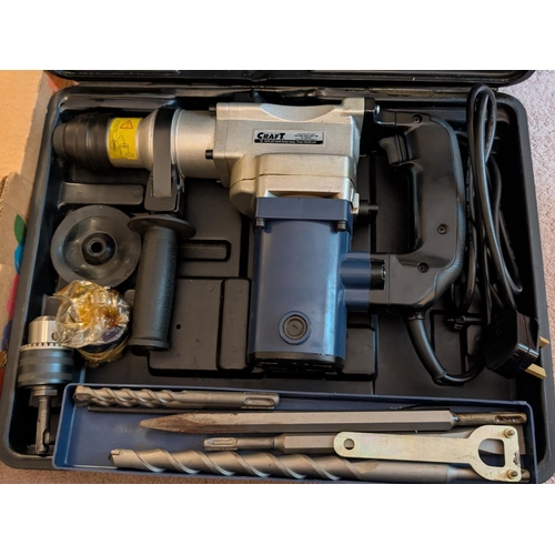 37 - A Power Craft hammer drill, and large drill bits.