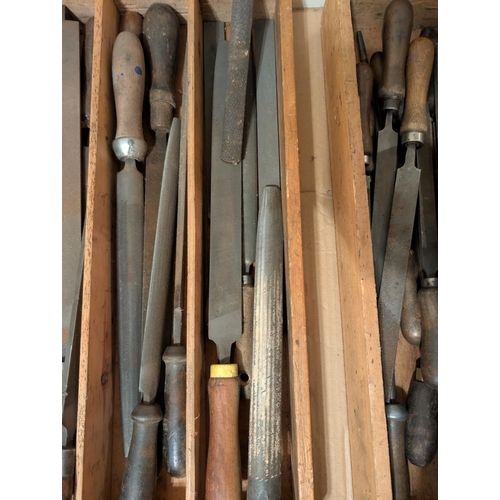 64 - A collection of vintage hand files with wooden handles, various makes, large sizes, 'Flat and rounde... 