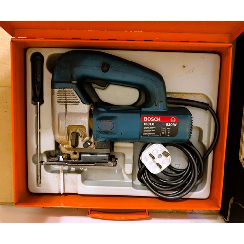 68 - A Bosch tin cased jigsaw 520w and a Bosch drill in case.