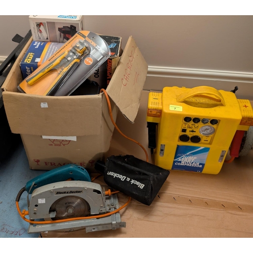 7 - A selection of boxed tools, loose 140mm circular saw and a jump start machine.