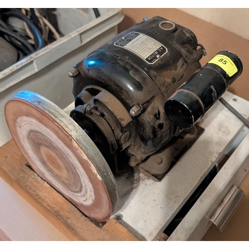 85 - A mechanical sanding device.