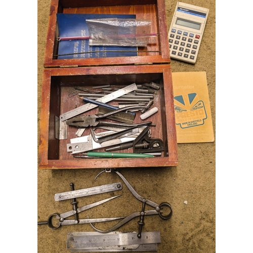 93 - A boxed collection of steel rulers, scribers gauges etc.