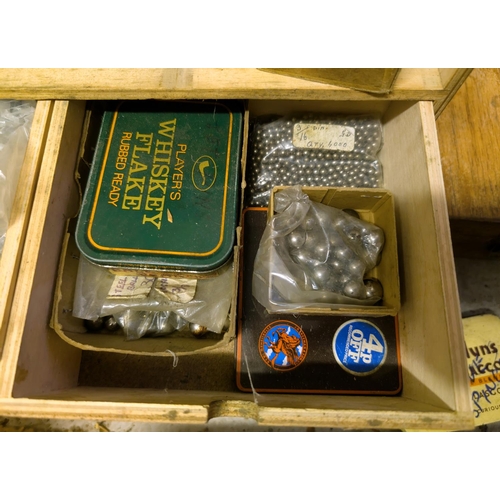 94 - A cabinet full of parts for plumbing for steam, ball bearings, nuts, bolts etc.