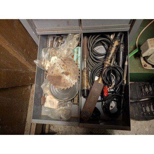 147 - A workshop cabinet containing five sets of letter punches, Stanley plane etc.