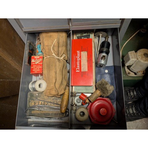 147 - A workshop cabinet containing five sets of letter punches, Stanley plane etc.