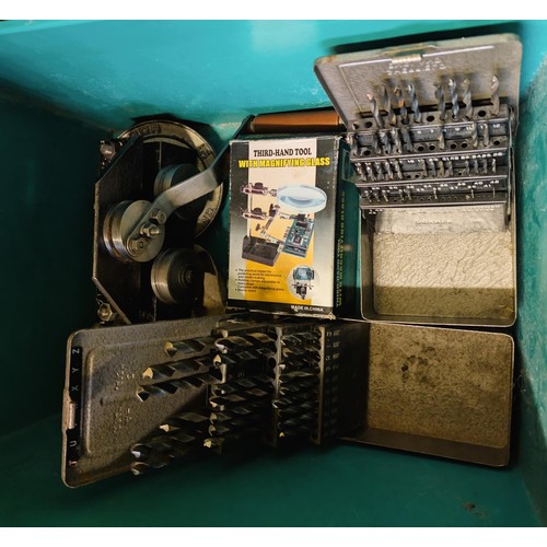 141 - Two part sets of drill bits, magnifier on stand and a pipe bender.