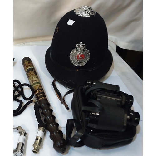 123 - A Police truncheon commemorating the General Strike May 1926; a vintage Police helmet, handcuffs, wh... 