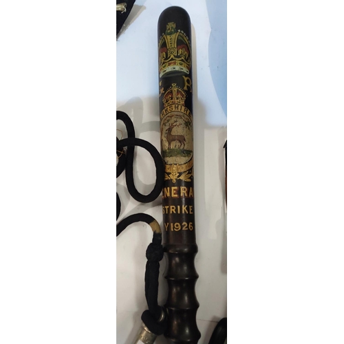 123 - A Police truncheon commemorating the General Strike May 1926; a vintage Police helmet, handcuffs, wh... 