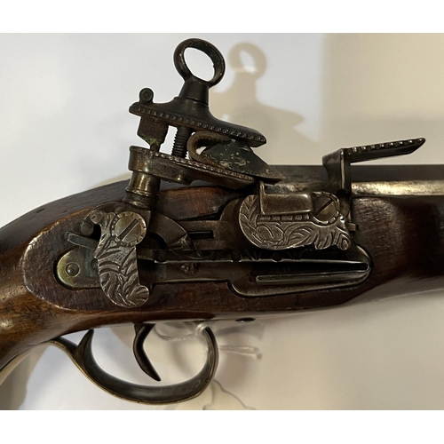 172 - An antique style flintlock pistol in the Spanish Micolay manner with cocking movement, brass fitting... 