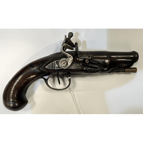 173 - An antique short barrel pistol with later additions, with cocking action, silvered fittings, shaped ... 