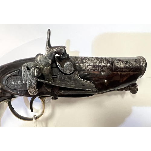 176 - An antique small Spanish Miccolay pocket pistol with etched and engraved barrel and plate,brass fing... 