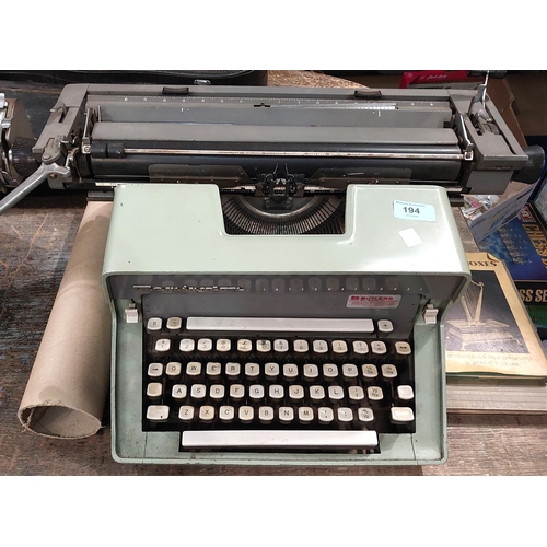 194 - 2 1950's office typewriters by Remington.