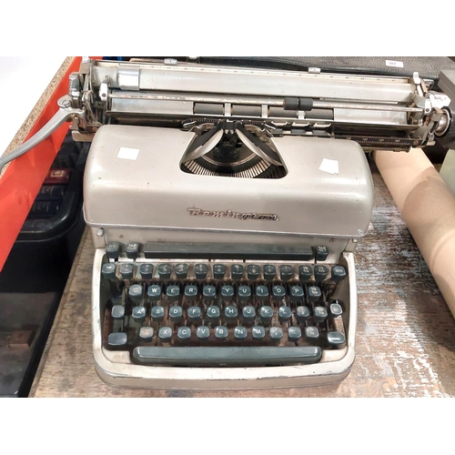 194 - 2 1950's office typewriters by Remington.