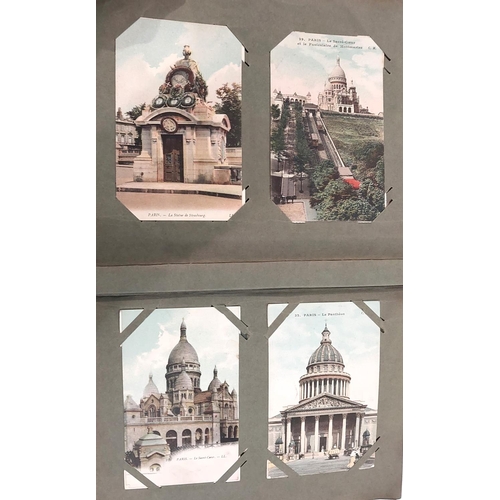 205 - A large early 20th century postcard album with WWI silk postcards of post WWI ruins, historical and ... 