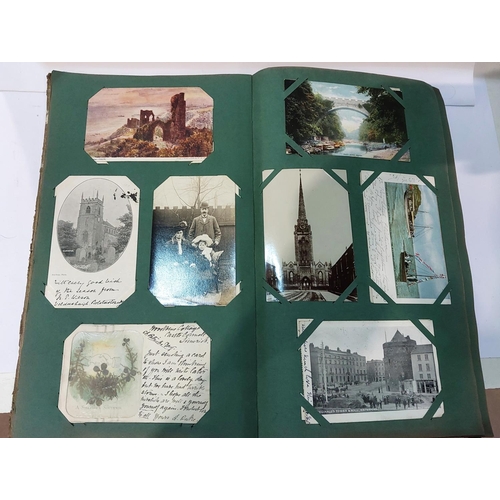 269 - Two large albums of vintage postcards, early 20th century.