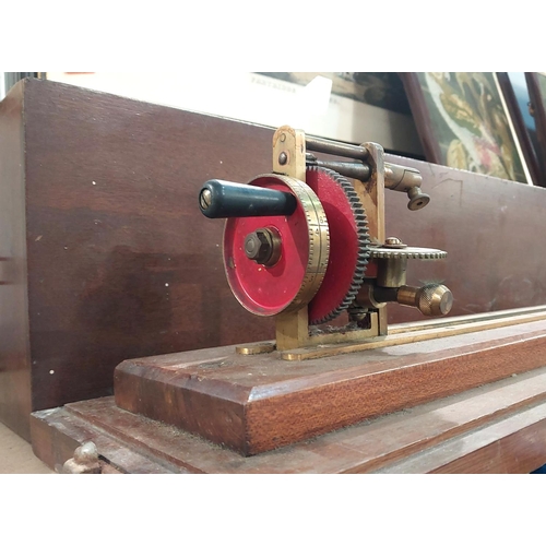 326 - A late 19th/early 20th century wool/yarn tester measure by James H Heal, in wooden case.