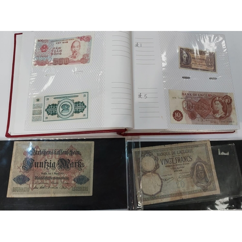 339 - An album of world banknotes.