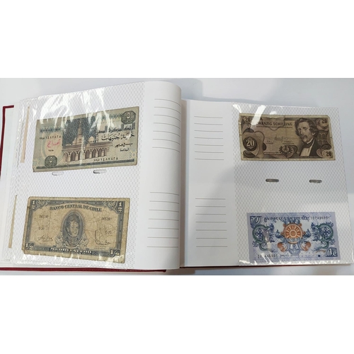 339 - An album of world banknotes.