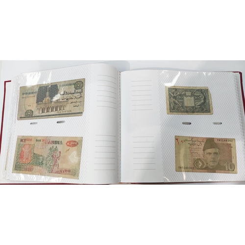 339 - An album of world banknotes.