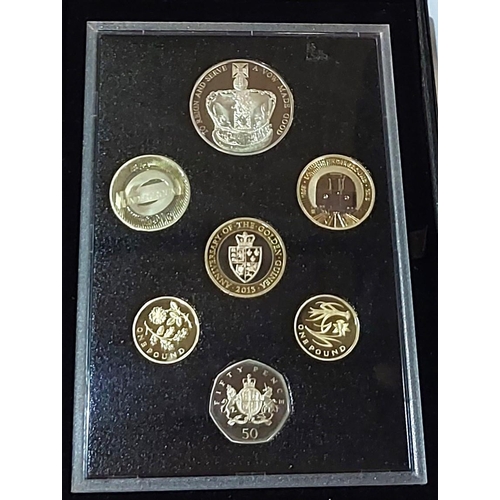 347 - A 2013 GB proof coin set, 'commemorative edition' and a set of 3 2013 silver proof £1 coins.