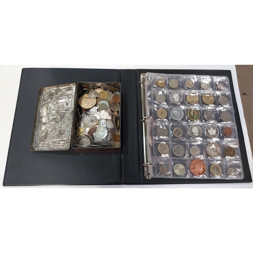 351 - An album of foreign coins and tokens and a quantity of coins in a tin.