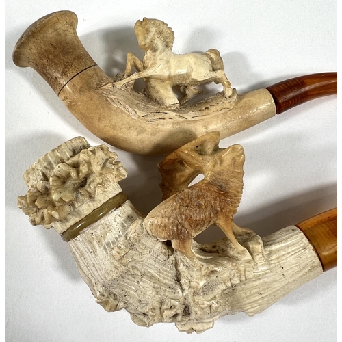 41 - 4 cased Meerschaum and amber pipes depicting a stag on a cliff; a reclining horse (head chipped), re... 