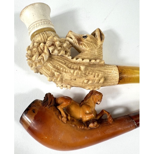 41 - 4 cased Meerschaum and amber pipes depicting a stag on a cliff; a reclining horse (head chipped), re... 