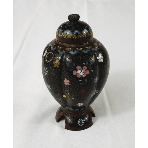 412 - A Japanese Meiji period lobed Cloisonne lidded vase with three feet under, floral decoration. Height... 