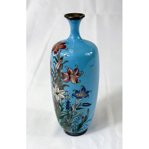 414 - A Japanese Meiji period Cloisonne vase with white metal wire decoration of flowers. Height 14cm (som... 