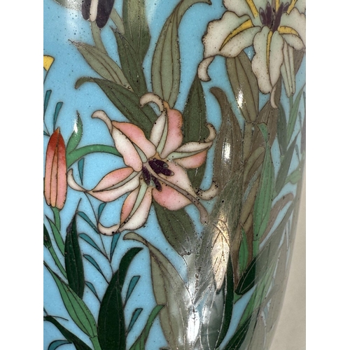 414 - A Japanese Meiji period Cloisonne vase with white metal wire decoration of flowers. Height 14cm (som... 