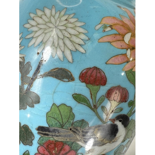 415 - A Japanese Meiji period Cloisonne vase blue ground with bird on flowering branch (some crazing) heig... 