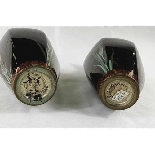 418 - A pair of Japanese Meiji period Cloisonne white metal wired vases with fine detail of trees and flow... 