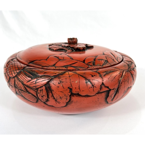 429 - A large 19th Century Chinese cinnabar lacquer covered bowl with leaves in relief, bearing Sainsbury'... 