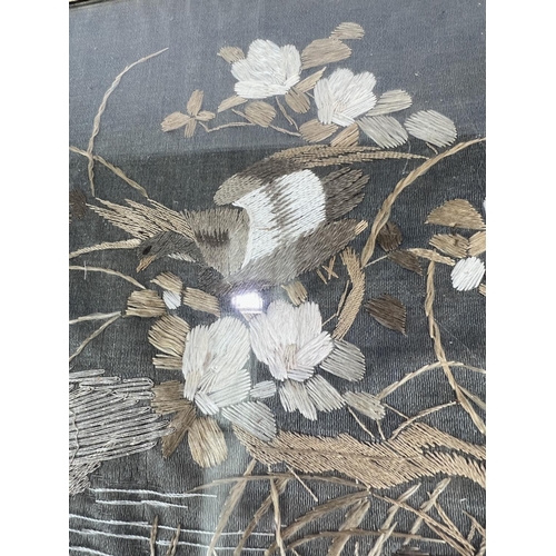 431 - A 19th century Chinese silk picture birds over water in birds eye maple frame.