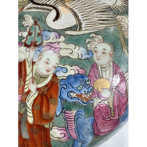 434 - A Chinese Famille Rose lidded bowl with extensive polychrome decoration with deities, birds, crabs, ... 