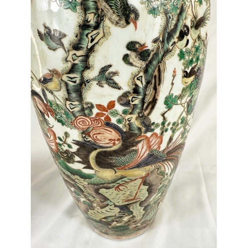 434B - A Chinese Famille Verte vase with polychrome decoration of birds on branches, height 44cm.