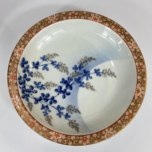 436 - A Japanese finely decorated dish with bird in gilt on blue ground and flowers on white ground, Mount... 