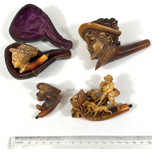 44 - 4 Meerschaum pipe bowls, 2 depicting women's heads, man walking dogs and an eagle on a rock (one wit... 