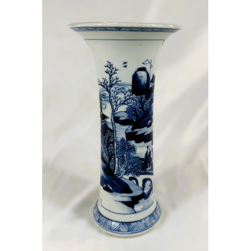 450 - A Chinese Kangxi period blue and white beaker vase, circa 1700, with traditional scenes, flared rim,... 