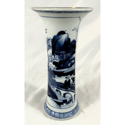 450 - A Chinese Kangxi period blue and white beaker vase, circa 1700, with traditional scenes, flared rim,... 