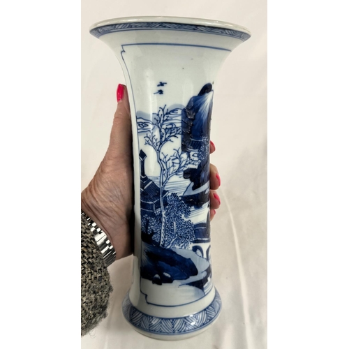 450 - A Chinese Kangxi period blue and white beaker vase, circa 1700, with traditional scenes, flared rim,... 