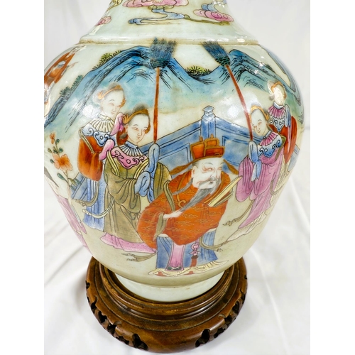 456 - A Chinese Famille Rose vase decorated with polychrome figures of people collecting flowers, with sea... 