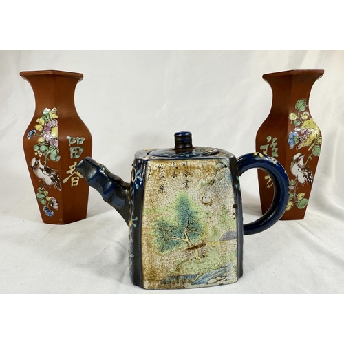 456A - A Chinese Yixing teapot with enamel decoration, seal mark impressed to base; two similar vases (a/f)... 