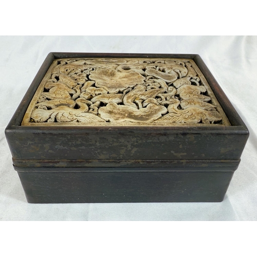 458B - A Chinese hardwood box with a pierced stone carving to the lid with birds and leaves. 16 1/2 x 14 x ... 